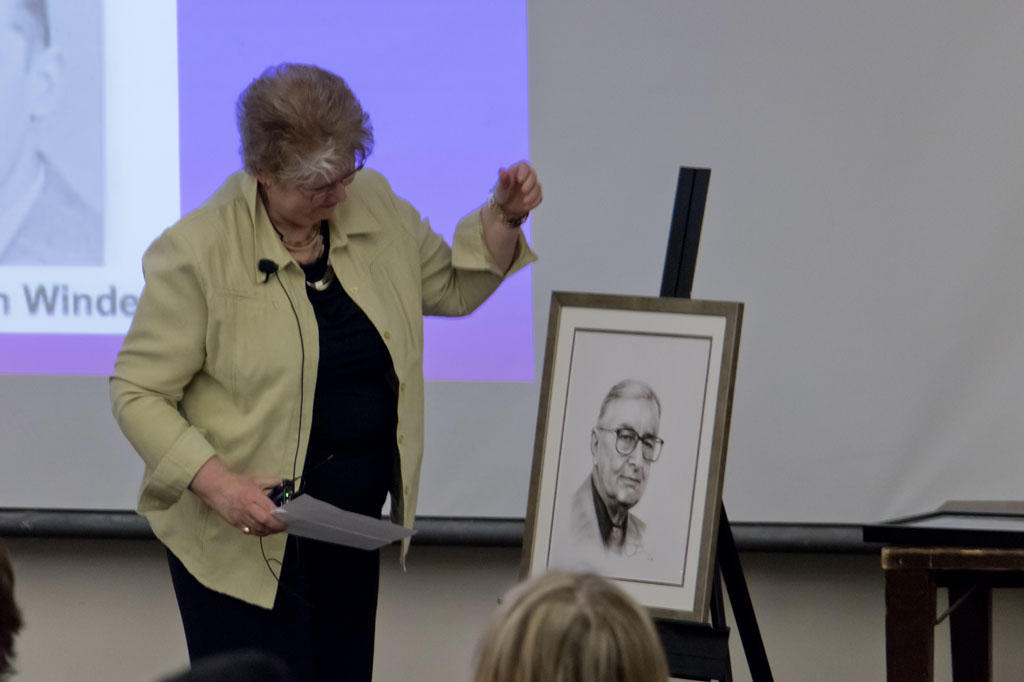 Mrs Holmes with a portrait of her father